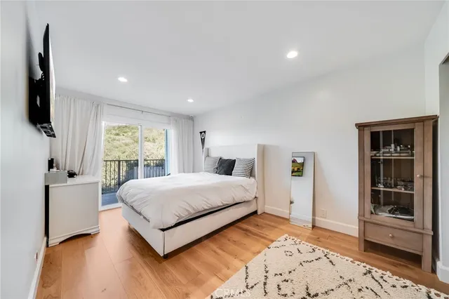 a view of a backyard with plants and a garden