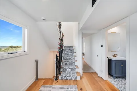a bathroom with a sink and mirror
