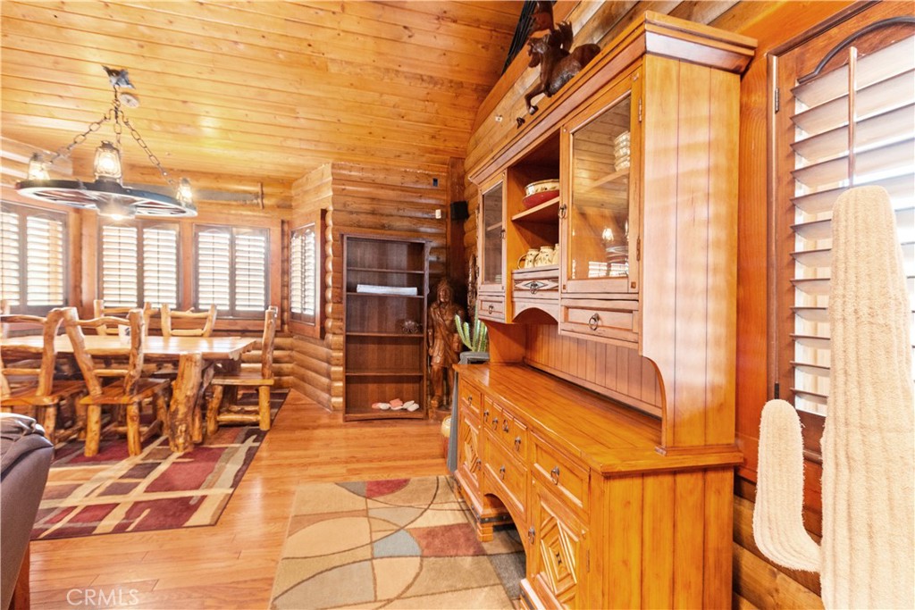 1870 Oak Springs Valley Road Wrightwood, CA 92397 - Photo 11 of 37 a lobby with furniture and floor to ceiling windows