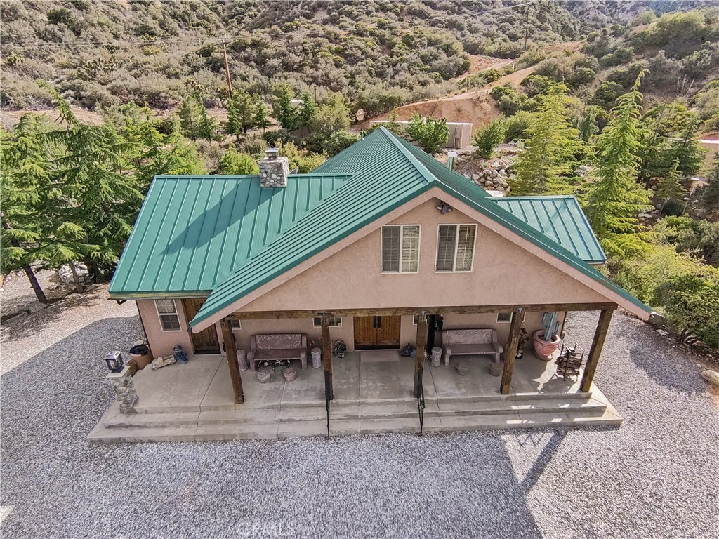 1870 Oak Springs Valley Road Wrightwood, CA 92397 - Photo 2 of 37 an outdoor view with patio