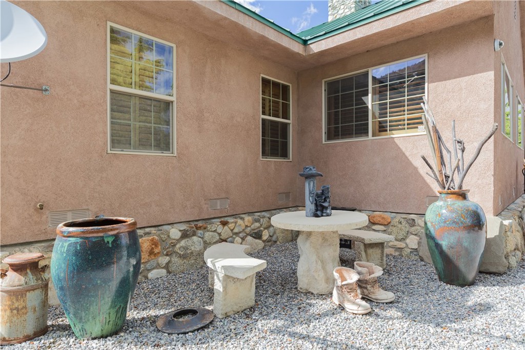 1870 Oak Springs Valley Road Wrightwood, CA 92397 - Photo 30 of 37 a view of a room that has a table and chairs