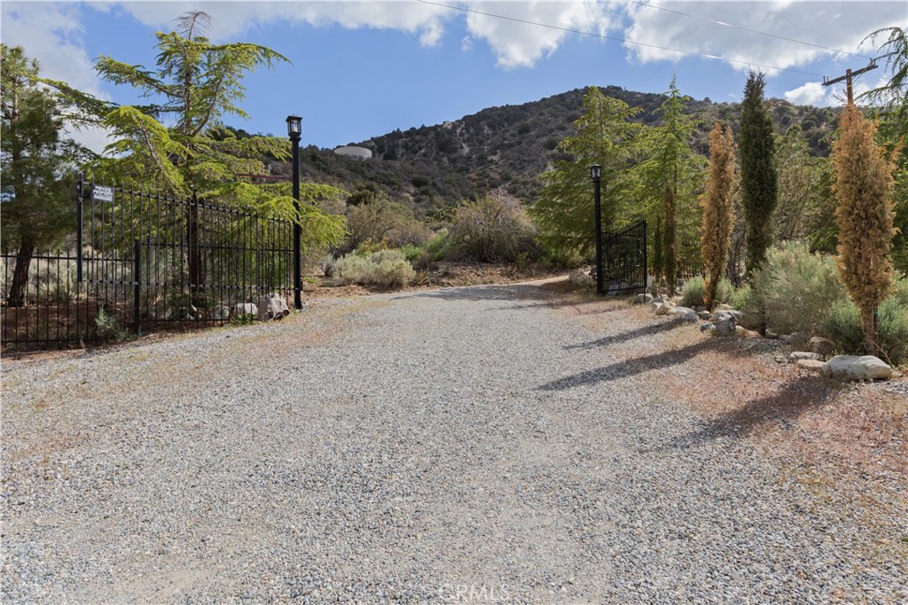 1870 Oak Springs Valley Road Wrightwood, CA 92397 - Photo 35 of 37 a view of a road with a building in the background
