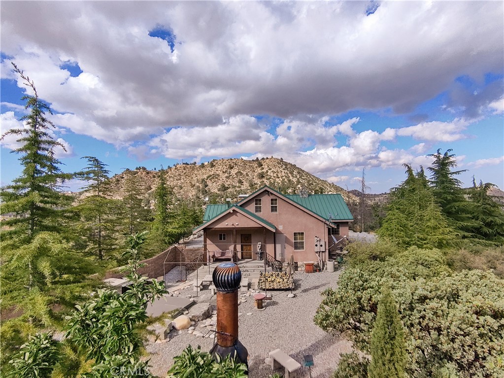 1870 Oak Springs Valley Road Wrightwood, CA 92397 - Photo 5 of 37 an aerial view of a house with a yard