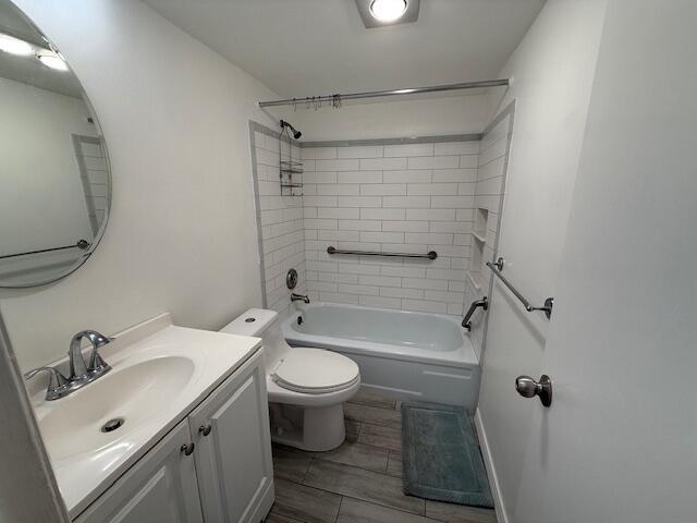 168 Northampton I West Palm Beach, FL 33417 - Photo 17 of 22 a bathroom with a sink toilet and shower