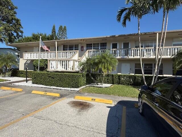 168 Northampton I West Palm Beach, FL 33417 - Photo 3 of 22 a view of a house with swimming pool and sitting area
