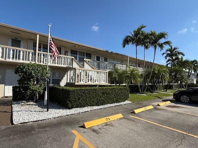 168 Northampton I West Palm Beach, FL 33417 - Photo 4 of 22 a view of a house with a swimming pool