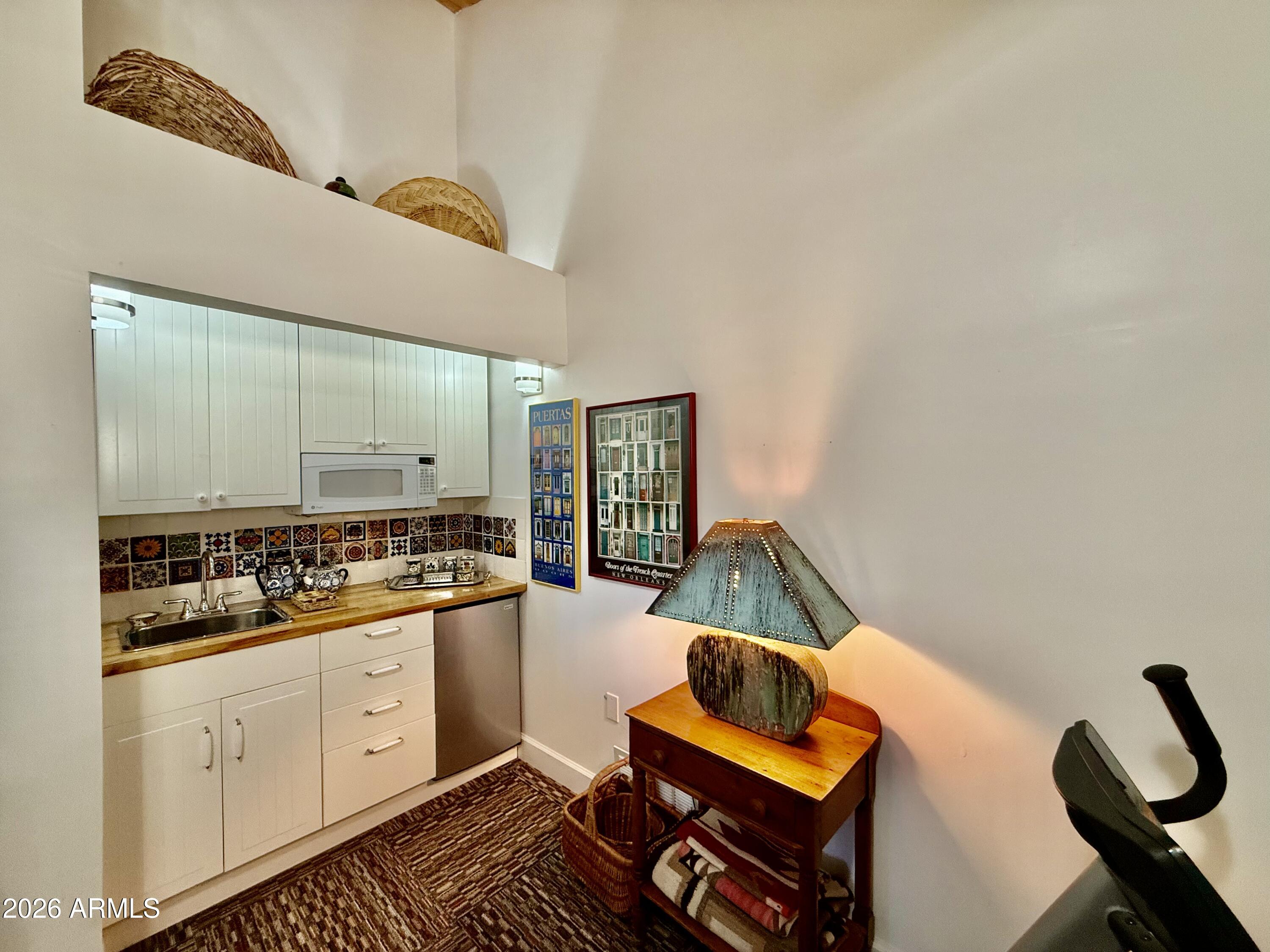 23403 Manzanita Road Crown King, AZ 86343 - Photo 71 of 74 Wet bar in gym