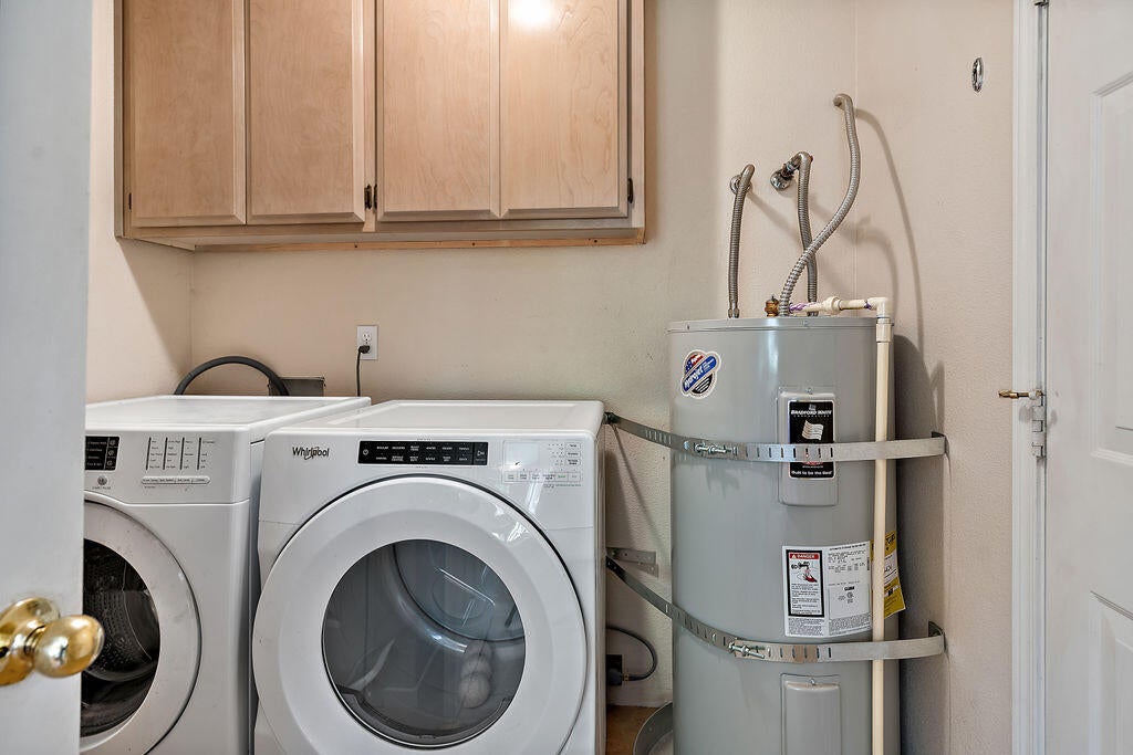 2286 Camp Baker Road Medford, OR 97501 - Photo 13 of 36 Laundry room off kitchen. Almost new washer and ventless dryer included.