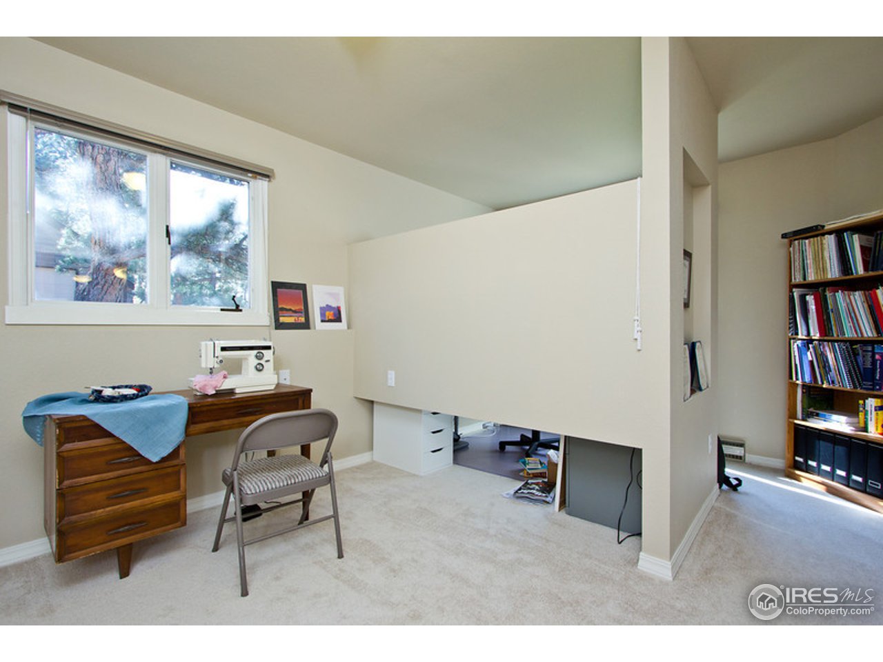 398 Broken Fence Road Boulder, CO 80302 - Photo 12 of 25 a living room with furniture and a window