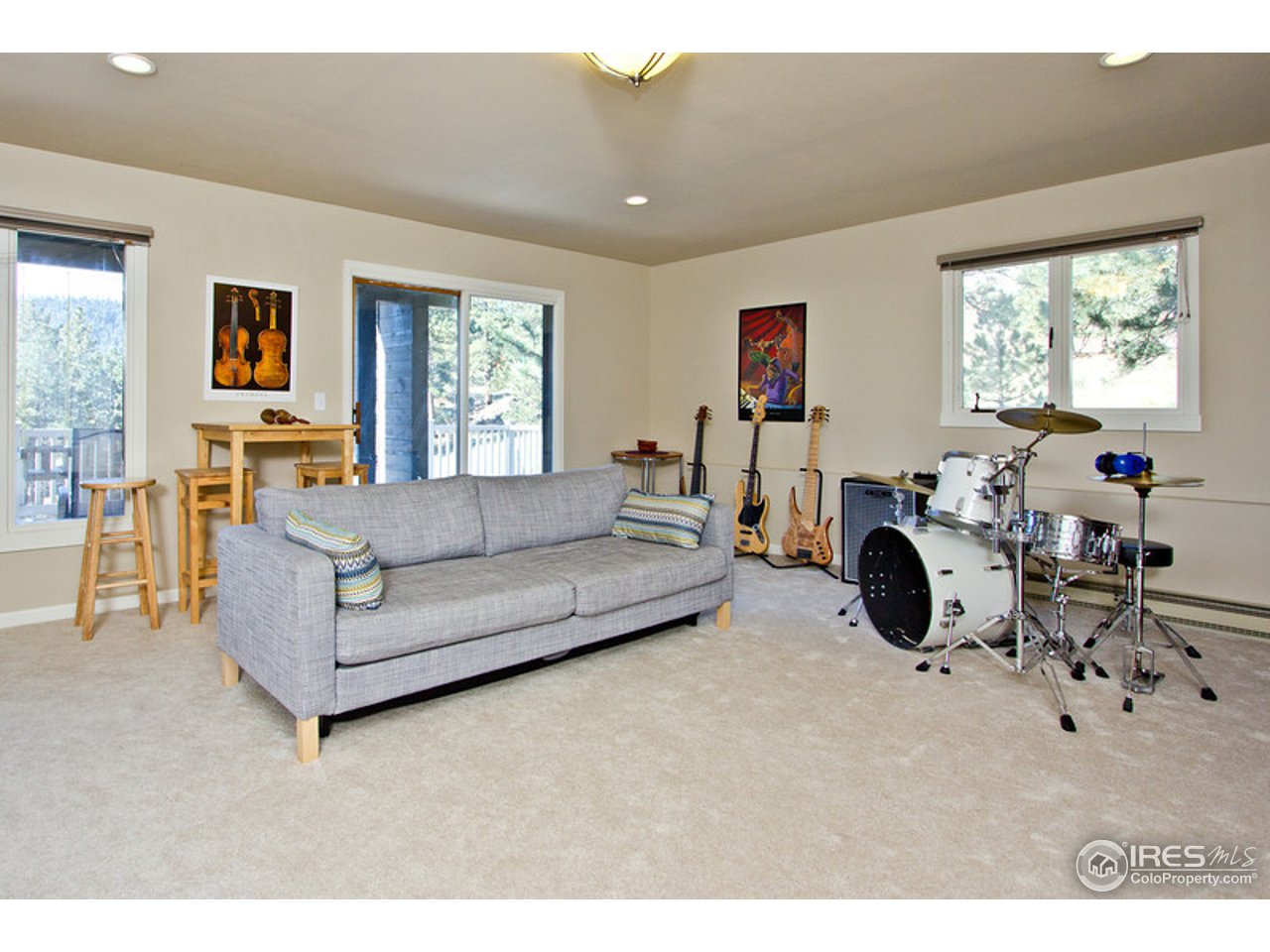 398 Broken Fence Road Boulder, CO 80302 - Photo 13 of 25 a living room with furniture and a large window