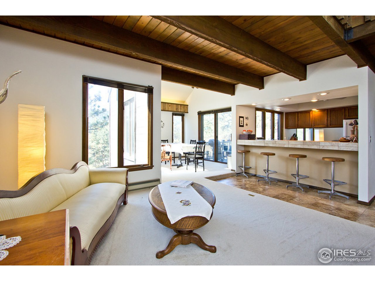 398 Broken Fence Road Boulder, CO 80302 - Photo 4 of 25 a living room with furniture and a large window