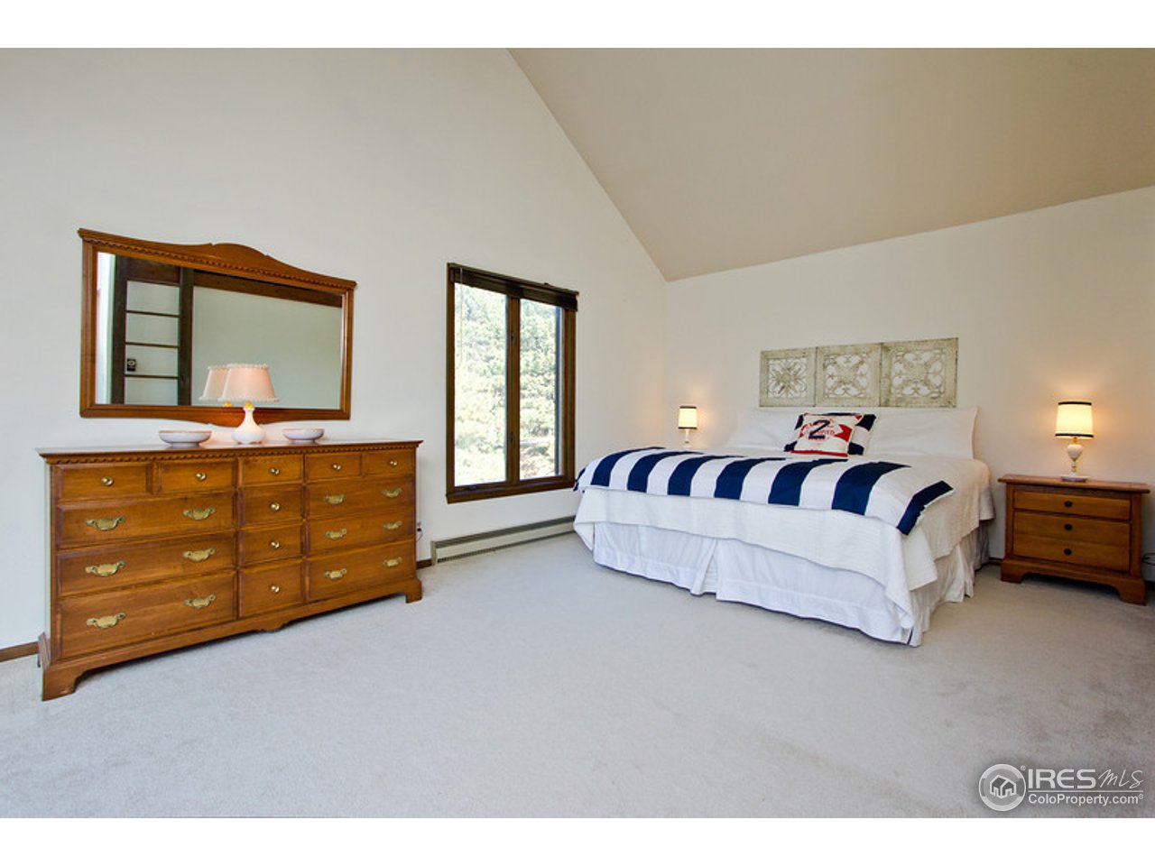 398 Broken Fence Road Boulder, CO 80302 - Photo 5 of 25 a living room with furniture and window