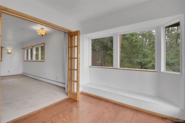 an empty room with windows