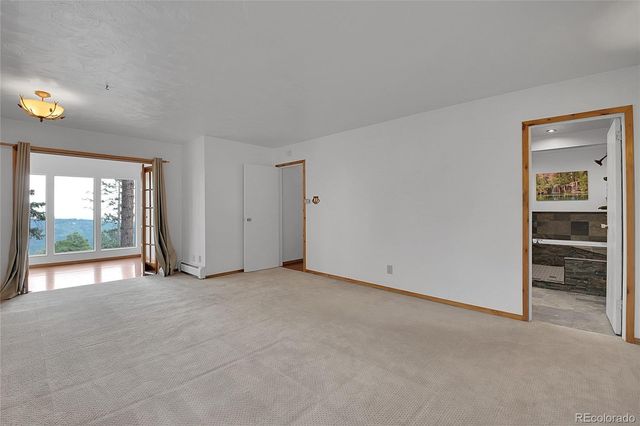 an empty room with windows