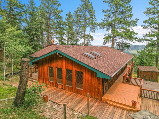 a backyard of a house with seating space
