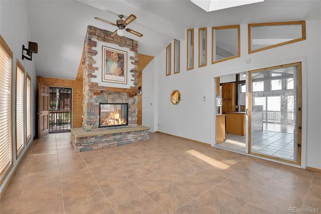 a view of a big room with windows