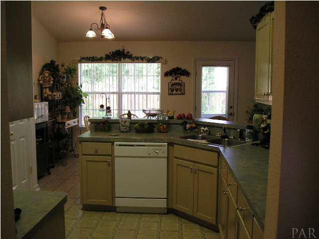 4178 Audiss Road Milton, FL 32583 - Photo 15 of 19 Entering kitchen from Formal Dining Room