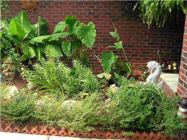 4178 Audiss Road Milton, FL 32583 - Photo 4 of 19 No $$$ was spared creating this awesome fish/koi pond creating a beautiful sitting area.