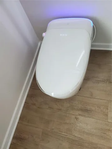 a view of staircase with white walls