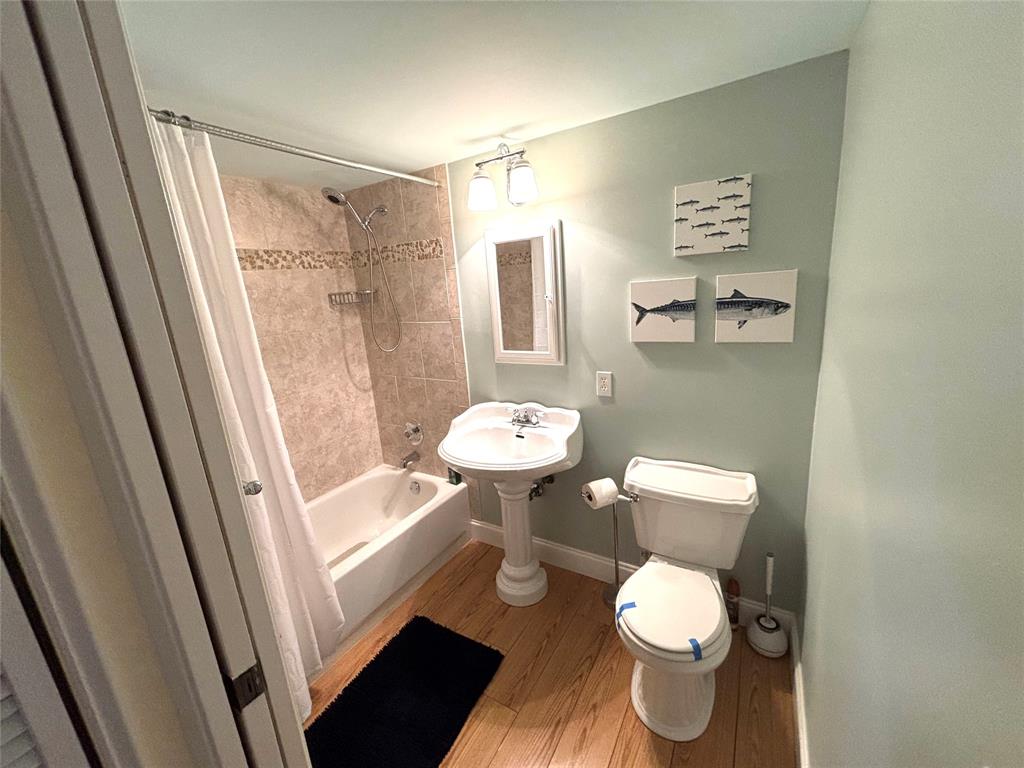2236 North Cypress Bend Drive, Unit 304 Pompano Beach, FL 33069 - Photo 16 of 17 a bathroom with a toilet and a shower