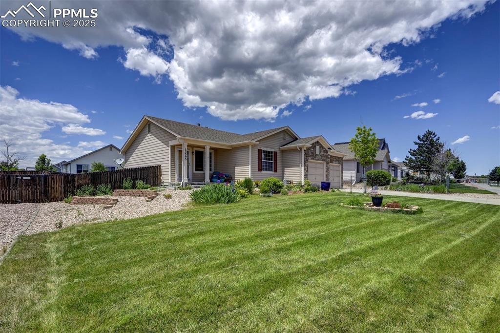Single story home featuring an attached garage