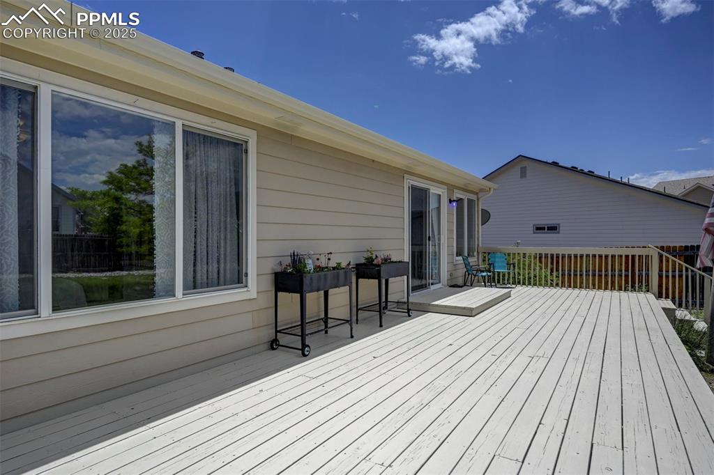 12593 Pine Valley Circle Peyton, CO 80831 - Photo 14 of 17 View of wooden deck
