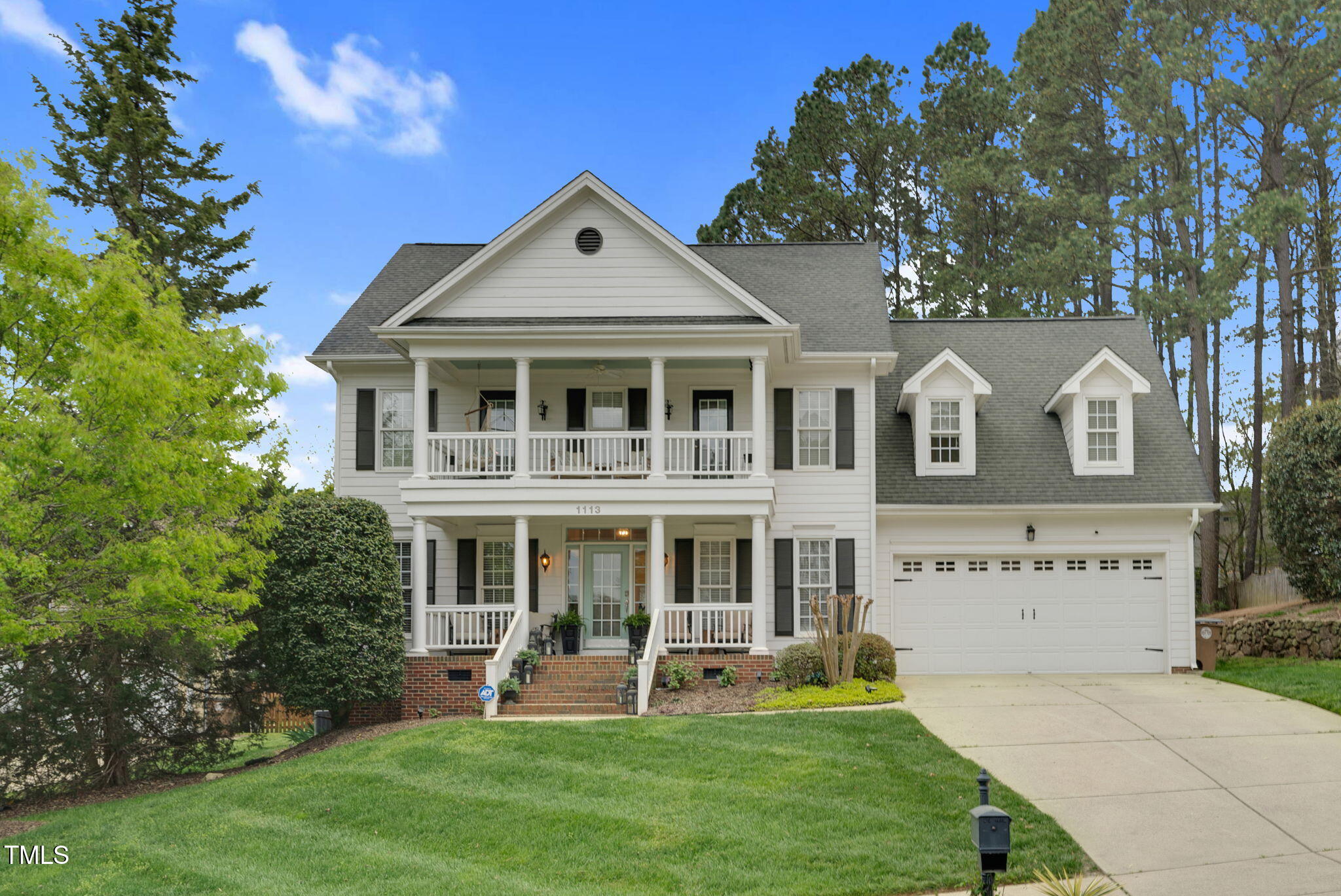 1113 Colonial Club Road Wake Forest, NC 27587 - Photo 1 of 41 a front view of a house with a yard