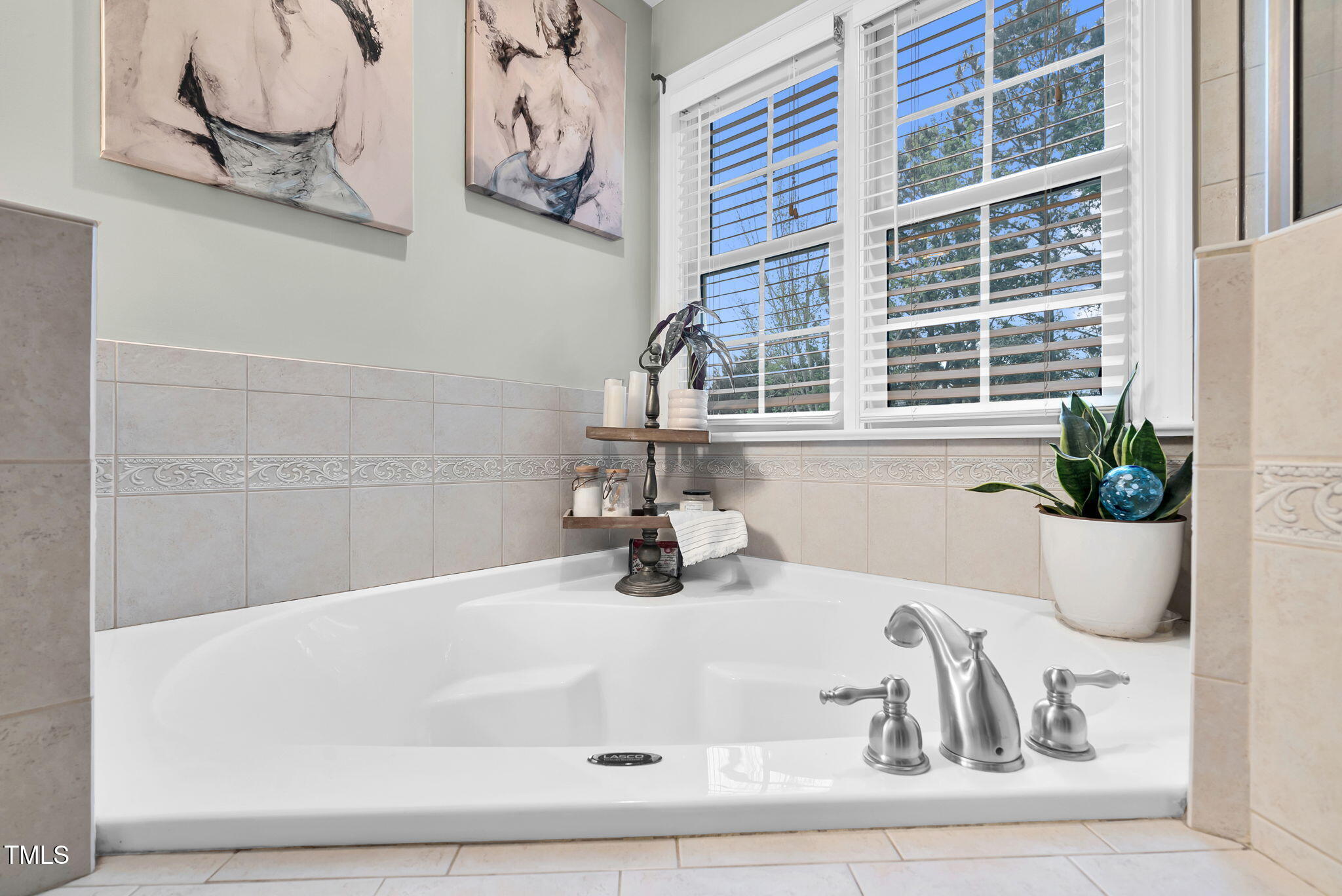 1113 Colonial Club Road Wake Forest, NC 27587 - Photo 35 of 41 a bathroom with a bathtub