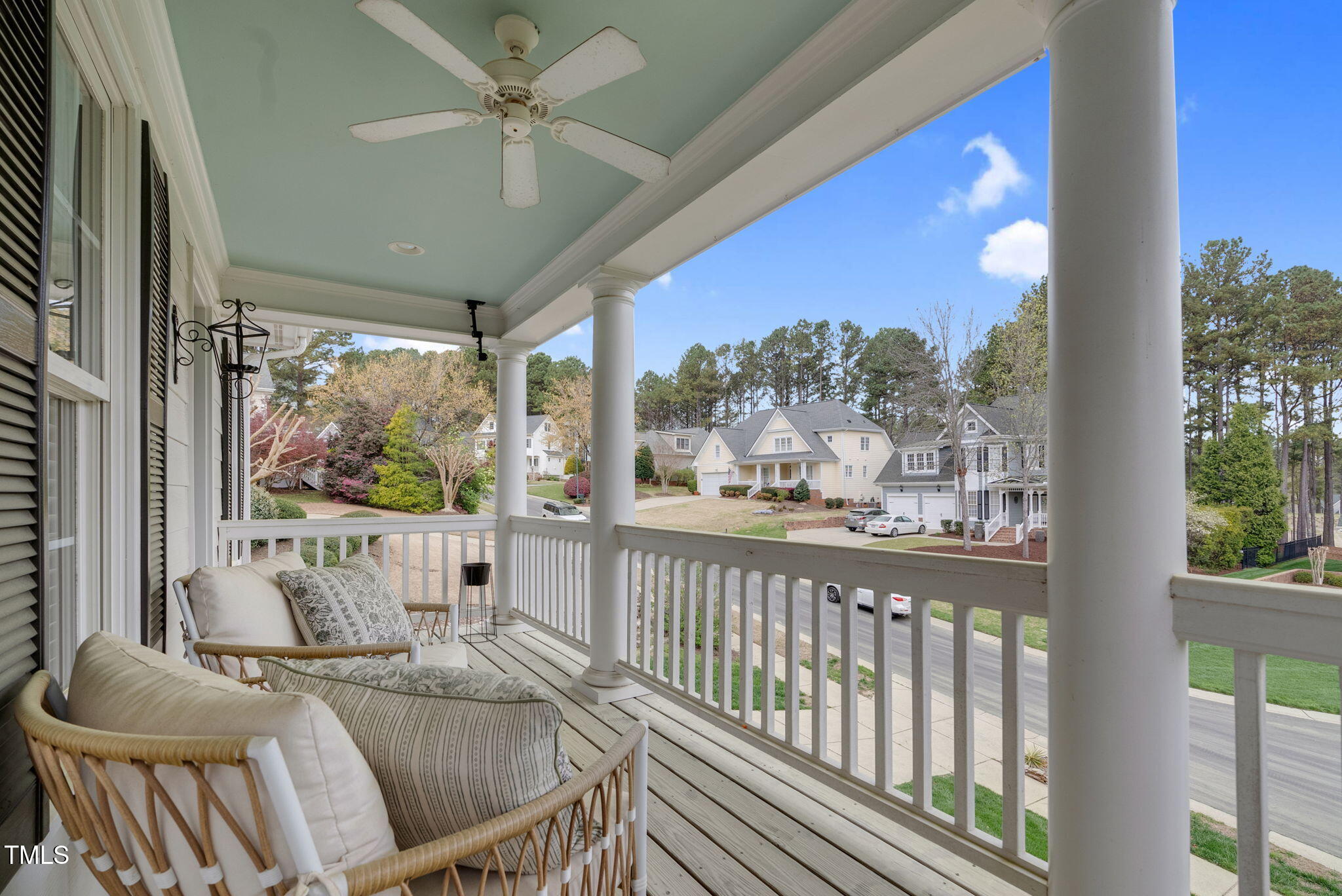 1113 Colonial Club Road Wake Forest, NC 27587 - Photo 36 of 41 a view of a dining room with furniture large windows and wooden floor