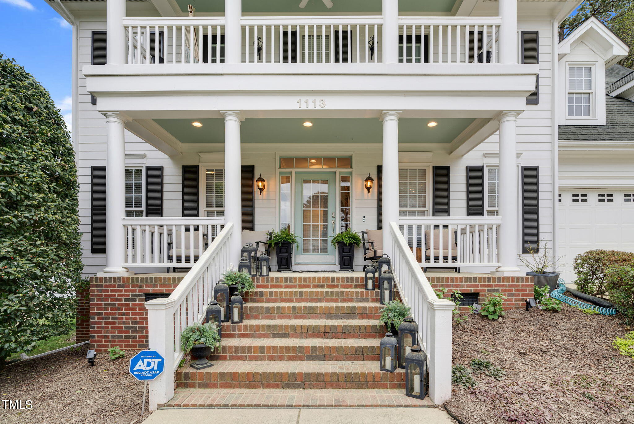 1113 Colonial Club Road Wake Forest, NC 27587 - Photo 3 of 41 a view of a house with a porch
