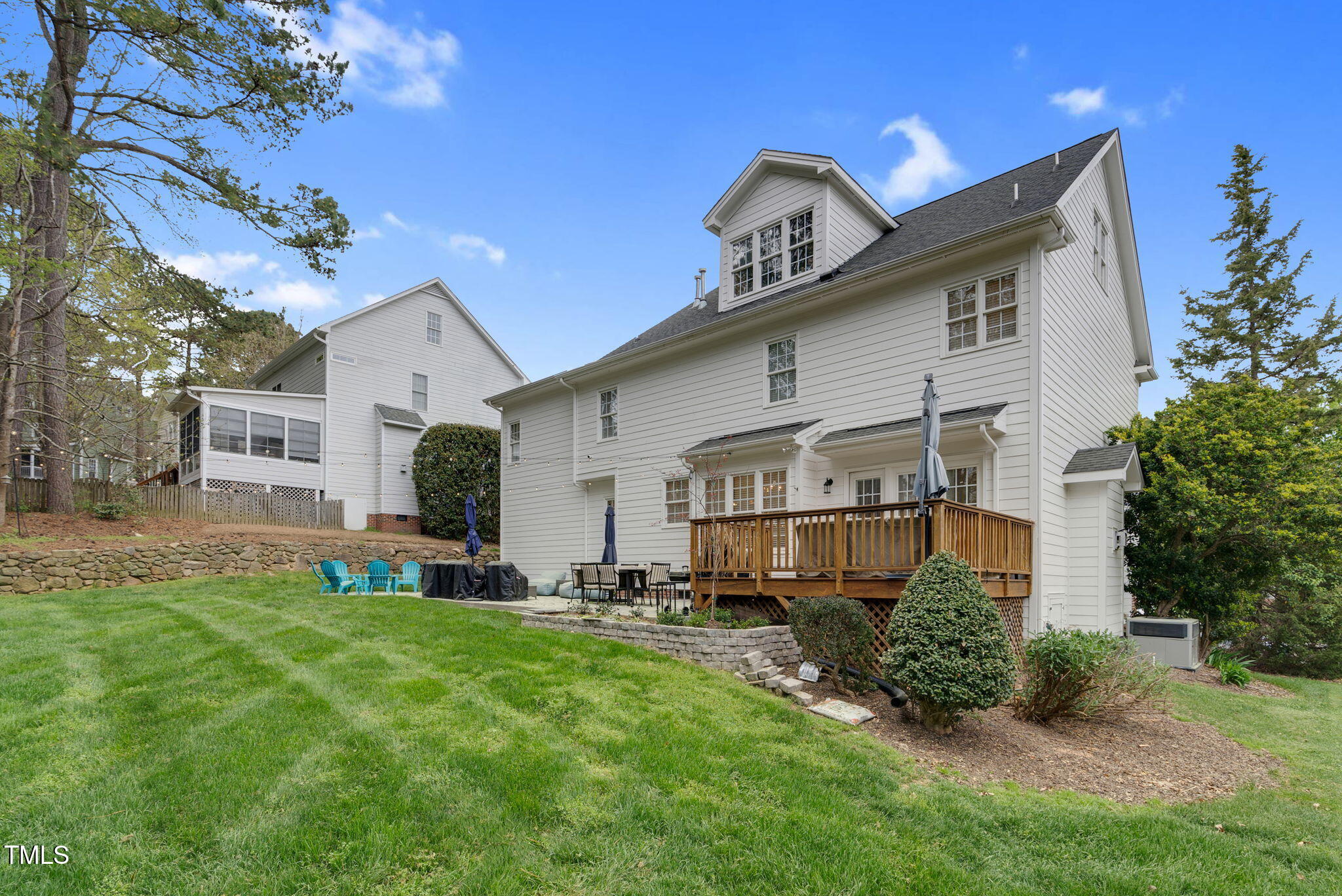 1113 Colonial Club Road Wake Forest, NC 27587 - Photo 40 of 41 a front view of a house with a yard and trees