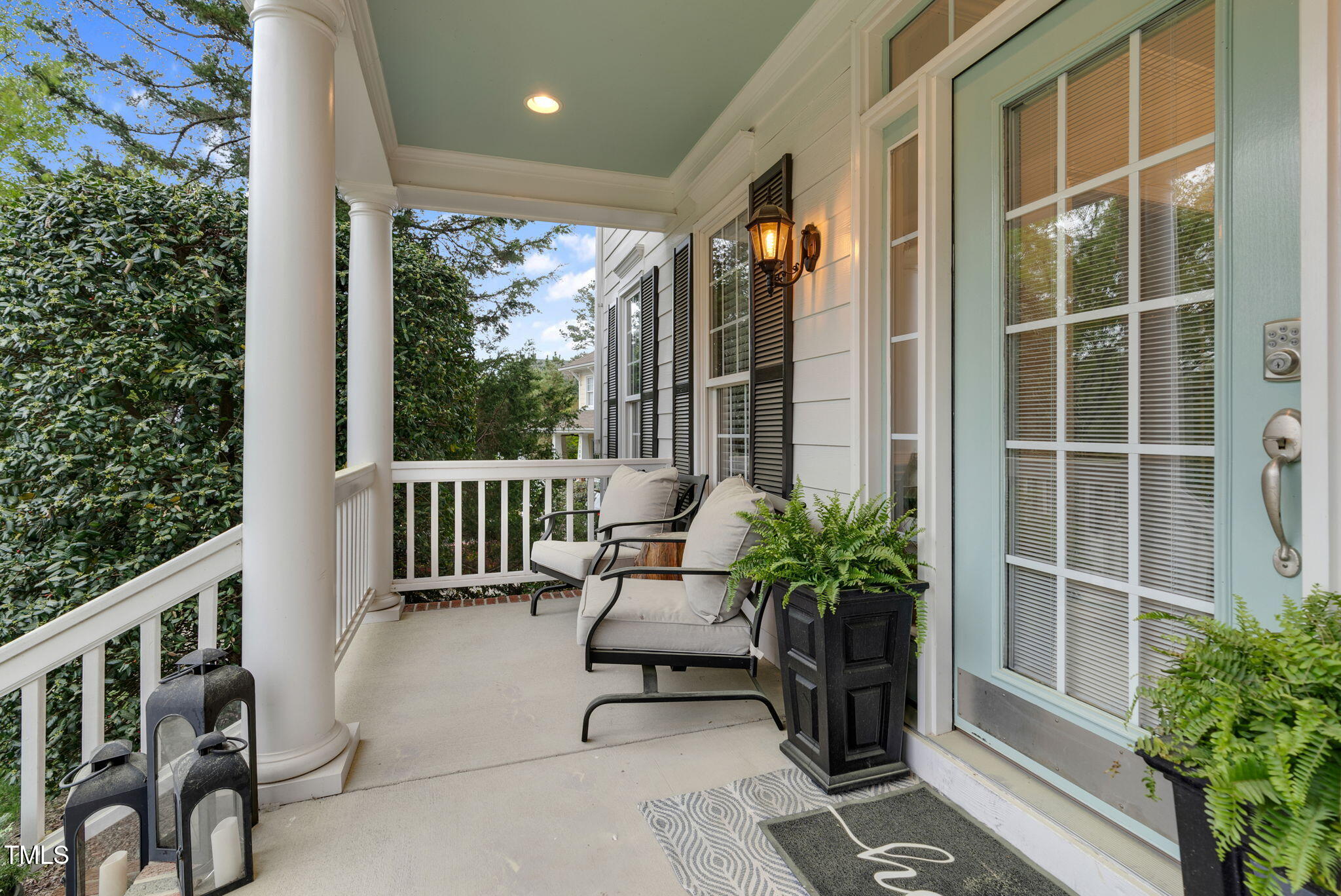 1113 Colonial Club Road Wake Forest, NC 27587 - Photo 4 of 41 a balcony with furniture and potted plants