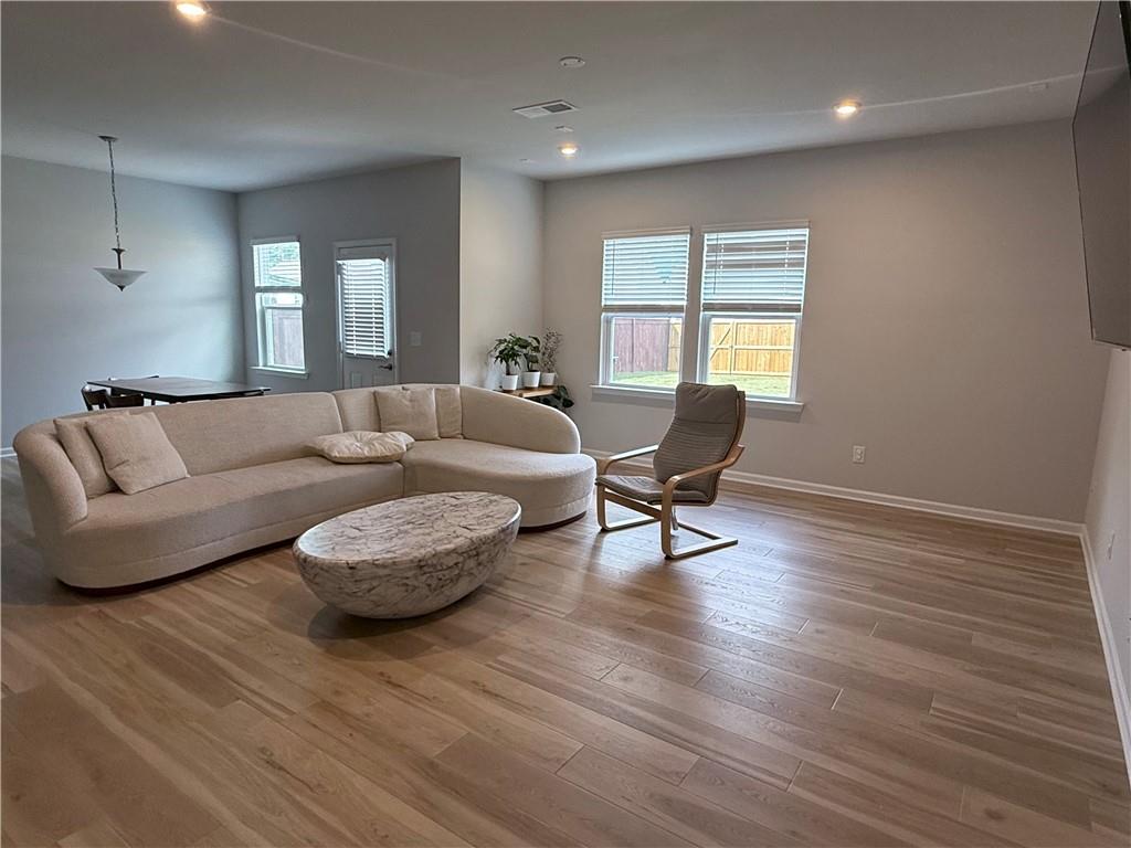 1543 Maston Road Auburn, GA 30011 - Photo 11 of 33 a living room with furniture and a window