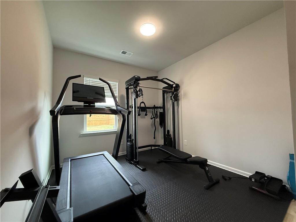 1543 Maston Road Auburn, GA 30011 - Photo 12 of 33 a view of a room with gym equipment