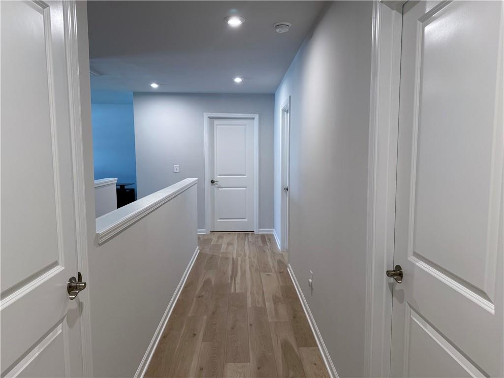 1543 Maston Road Auburn, GA 30011 - Photo 14 of 33 a view of a hallway and wooden floor