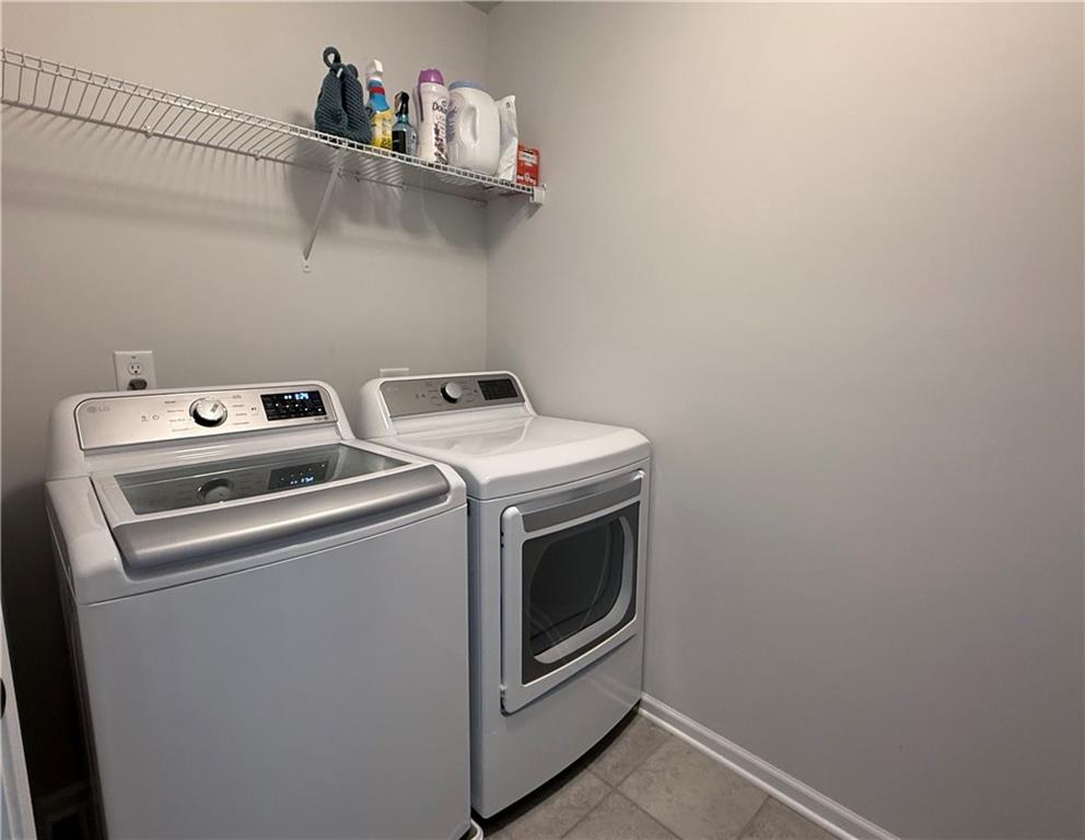 1543 Maston Road Auburn, GA 30011 - Photo 16 of 33 a utility room with dryer and washer
