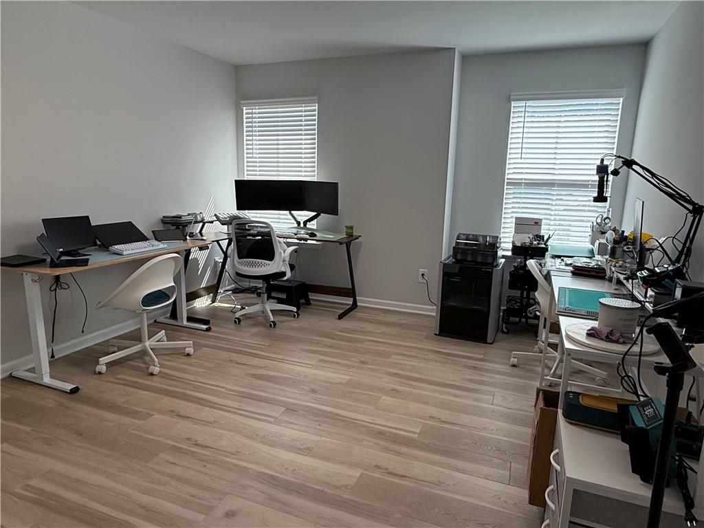 1543 Maston Road Auburn, GA 30011 - Photo 18 of 33 a view of a workspace with furniture and a window