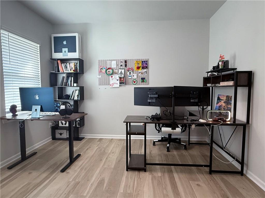 1543 Maston Road Auburn, GA 30011 - Photo 3 of 33 a living room with furniture and a flat screen tv