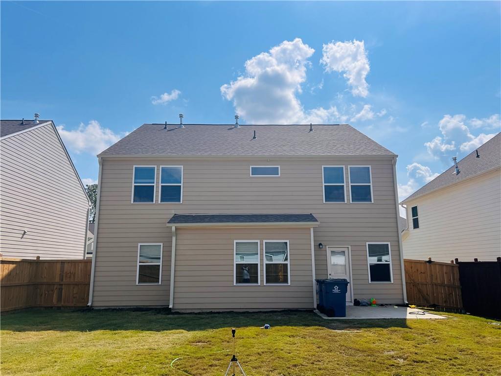 1543 Maston Road Auburn, GA 30011 - Photo 32 of 33 a view of a house with a swimming pool