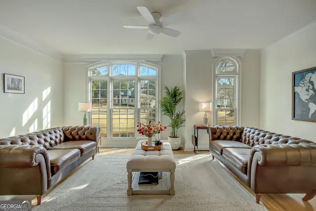 a kitchen with a sink stainless steel appliances cabinets and a counter top space
