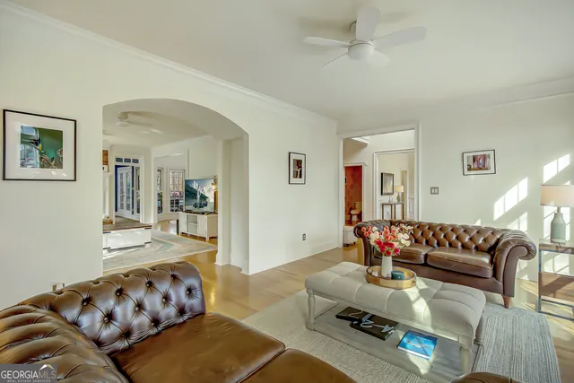 a large kitchen with kitchen island a sink a counter space and stainless steel appliances