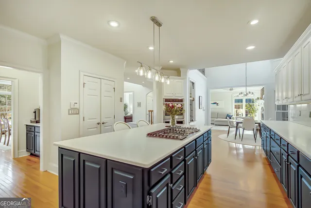 a large bathroom with a double vanity sink a large mirror and shower