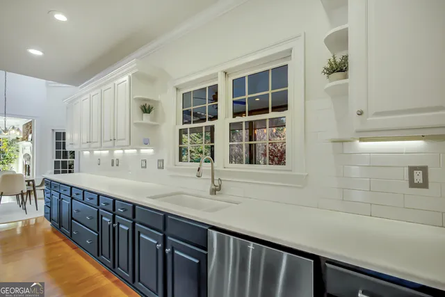a bedroom with a bed chair and a window