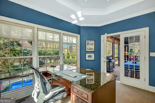 a room with furniture and wooden floor