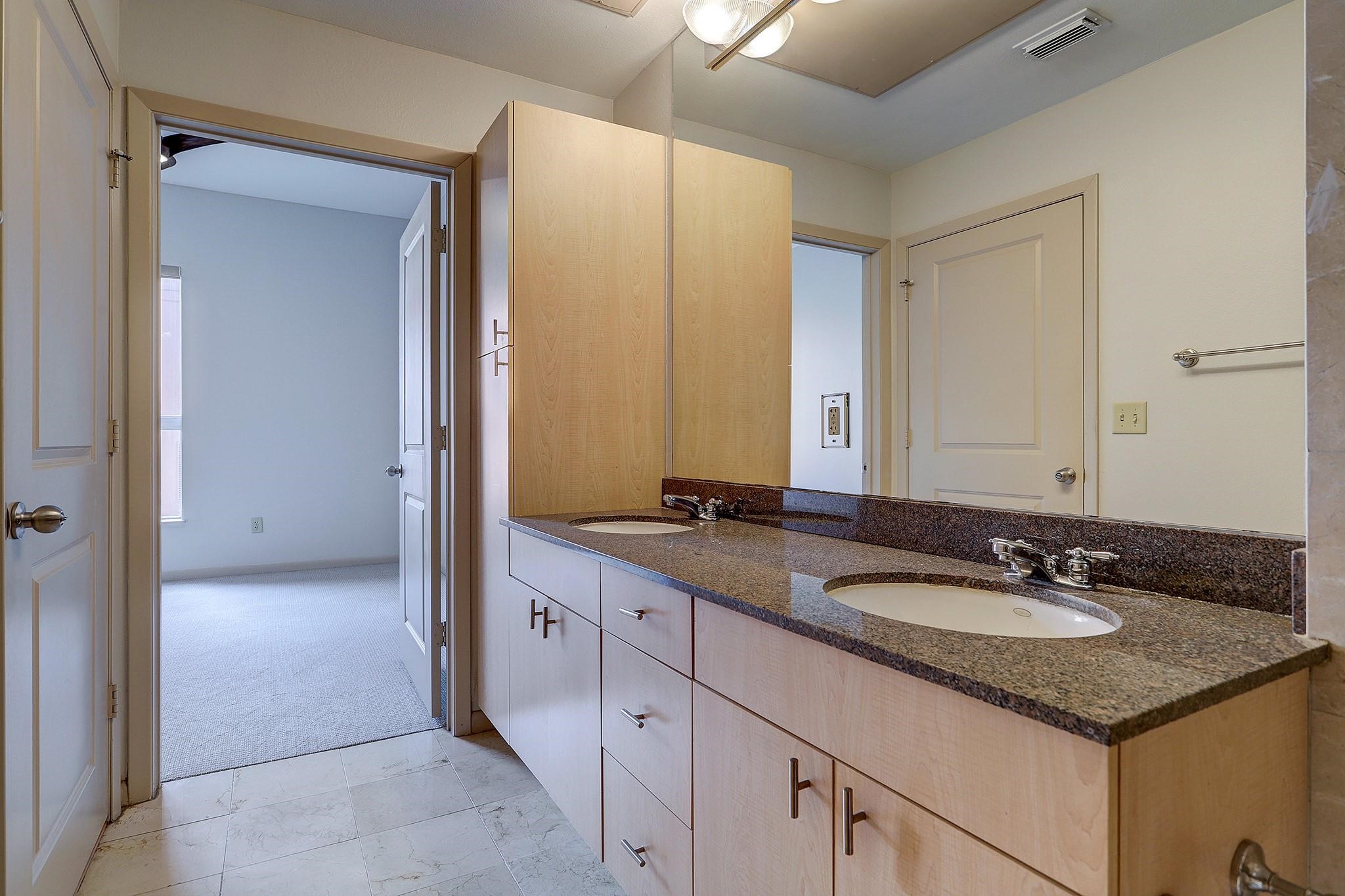 3505 Sage Road, Unit 207 Houston, TX 77056 - Photo 12 of 21 Storage space is endless in this bathroom!