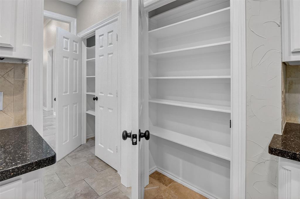2122 Clear Lake Road Weatherford, TX 76087 - Photo 17 of 40 Two nice-size pantries in the kitchen area.