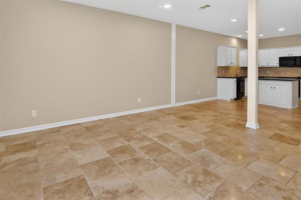 2122 Clear Lake Road Weatherford, TX 76087 - Photo 22 of 40 View from family room into breakfast area and kitchen.