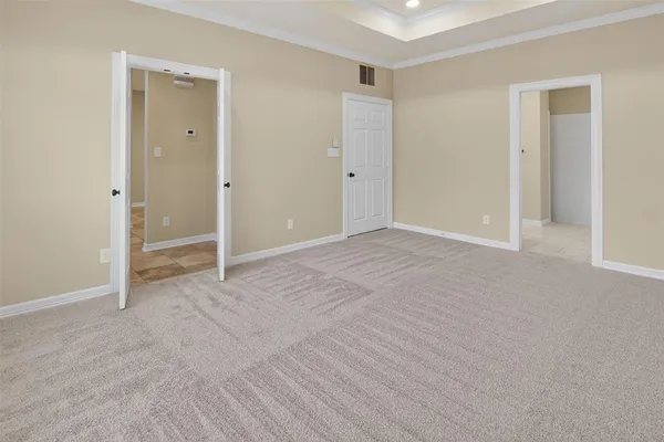 a bathroom with double sink and a mirror