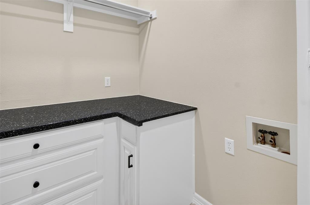 2122 Clear Lake Road Weatherford, TX 76087 - Photo 37 of 40 Folding area, storage, and washer and dryer hook-up.