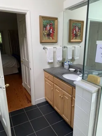 a living room with a couch and a flat screen tv